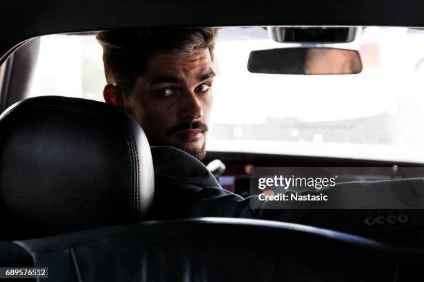 limo driver - taxi driver stock pictures, royalty-free photos & images