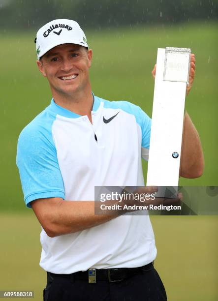 Alex Noren of Sweden poses with the trophy after winning the BMW PGA Championship at Wentworth on May 28, 2017 in Virginia Water, England.