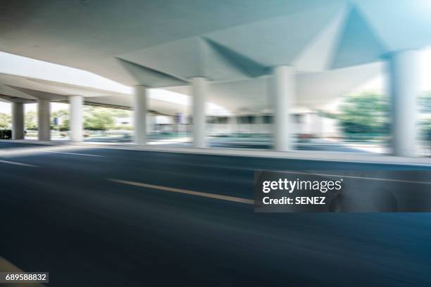 fast moving road in motion - fast motion stock pictures, royalty-free photos & images