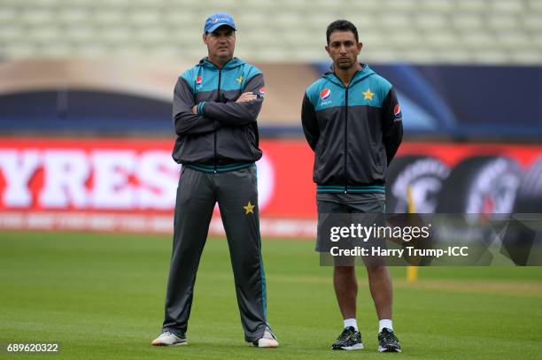 Mickey Arthur, Head Coach of Pakistan and Azhar Mahmood, Bowling Coach of Pakistan look on during the ICC Champions Trophy Warm-up match between...