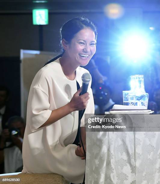 Former women's world No. 1 golfer Ai Miyazato attends a press conference in Tokyo on May 29 to formally announce her decision to retire. The...
