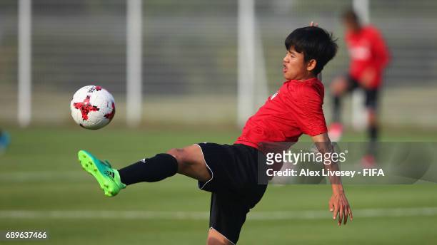 Takefusa Kubo of Japan in action during a training session at the Daejeon World Cup Stadium training pitch during the FIFA U-20 World Cup on May 29,...