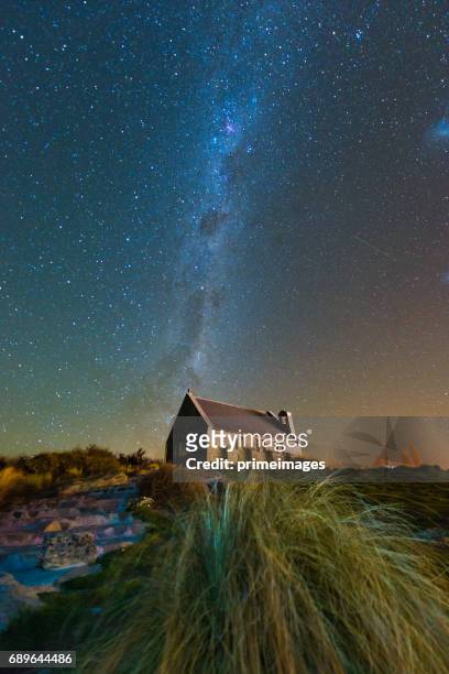 church of the good shepherd and the milky way, lake tekapo, new zealand - church of the good shepherd tekapo stock pictures, royalty-free photos & images