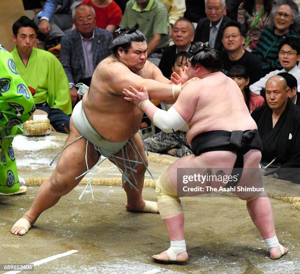 Mongolian ozeki Terunofuji and sekiwake Takayasu compete during day fifteen of the Grand Sumo Summer Tournament at Ryogoku Kokugikan on May 28, 2017...