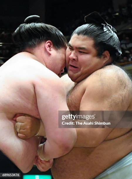 Mongolian ozeki Terunofuji and sekiwake Takayasu compete during day fifteen of the Grand Sumo Summer Tournament at Ryogoku Kokugikan on May 28, 2017...