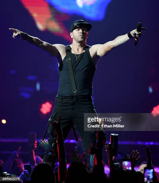 Singer Donnie Wahlberg of New Kids on the Block performs during a stop of The Total Package Tour at T-Mobile Arena on May 28, 2017 in Las Vegas,...