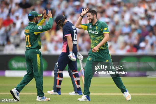 Wayne Parnell of South Africa celebrates with JP Duminy after dismissing David Willey of England during the 3rd Royal London ODI between England and...