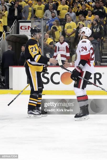 Evgeni Malkin of the Pittsburgh Penguins shakes hands with Viktor Stalberg of the Ottawa Senators after winning Game Seven of the Eastern Conference...