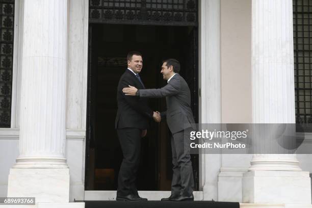 Alexis Tsipras wellcomes his Estonian counterpart Juri Ratas, in Athens on May 29, 2017
