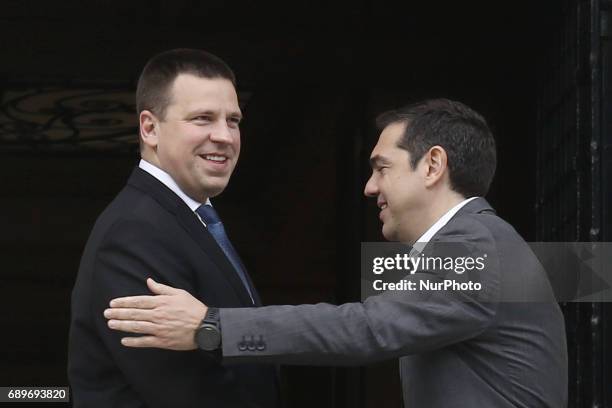 Alexis Tsipras wellcomes his Estonian counterpart Juri Ratas, in Athens on May 29, 2017