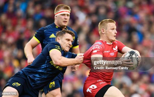 Dublin , Ireland - 27 May 2017; Johnny McNicholl of Scarlets is tackled by Rory Scannell of Munster during the Guinness PRO12 Final between Munster...