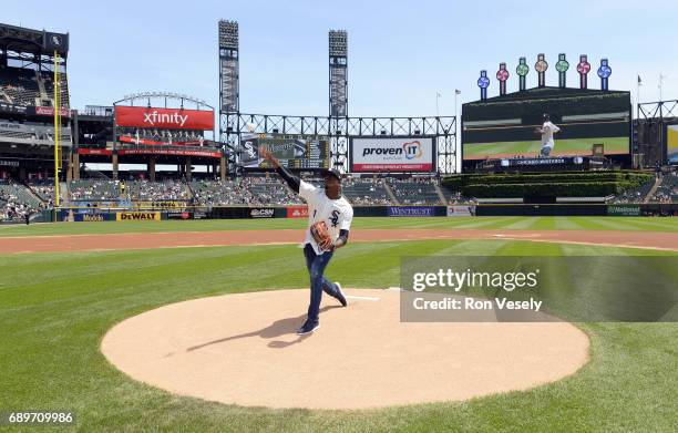 Cuban outfielder Luis Robert of the Chicago White Sox throws out a ceremonial first pitch prior to the game against the Detroit Tigers on May 27,...