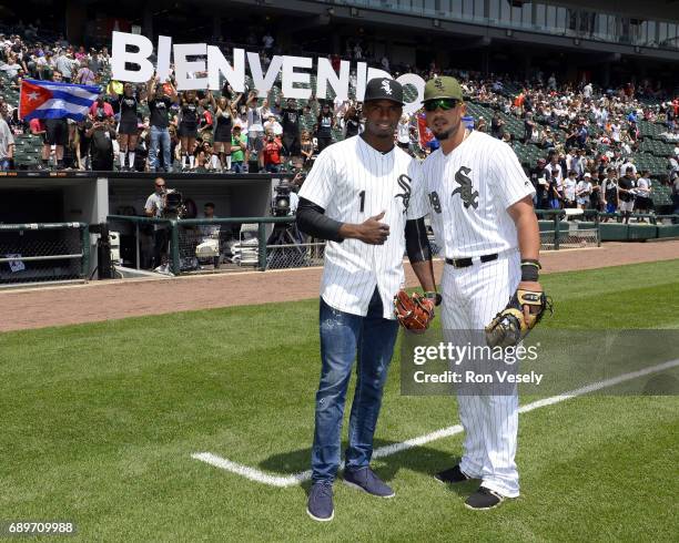 Cuban outfielder Luis Robert and first baseman Jose Abreu of the Chicago White Sox pose for a photo prior to the game against the Detroit Tigers on...