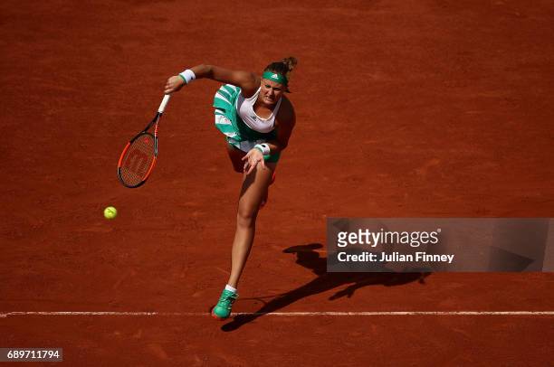 Kristina Mladenovic of France serves during the first round match against Jennifer Brady of The USA on day two of the 2017 French Open at Roland...