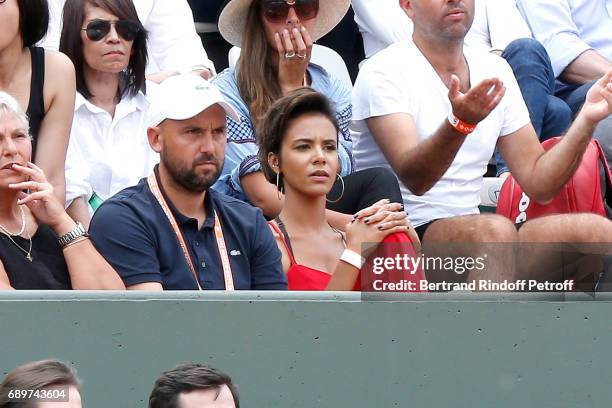 Singer Shy'm watching the match of her companion Benoit Paire against Rafael Nadal during the 2017 French Tennis Open - Day Two at Roland Garros on...