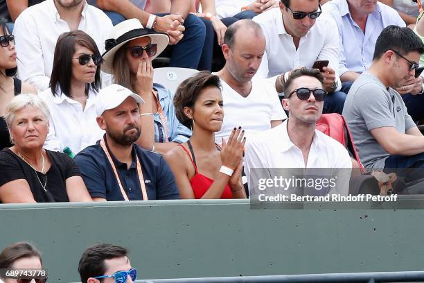 Singer Shy'm watching the match of her companion Benoit Paire against Rafael Nadal during the 2017 French Tennis Open - Day Two at Roland Garros on...