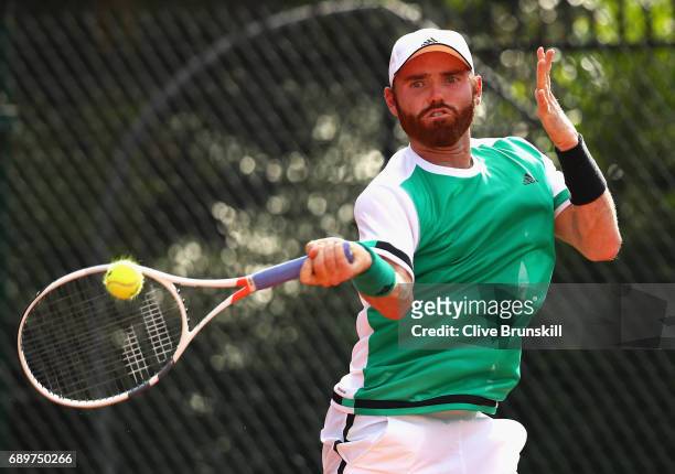 Bjorn Fratangelo of The United States plays a forehand during the mens singles first round match against Feliciano Lopez of Spain on day two of the...