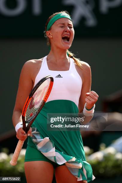 Kristina Mladenovic of France celebrates winning a point during the first round match against Jennifer Brady of The USA on day two of the 2017 French...