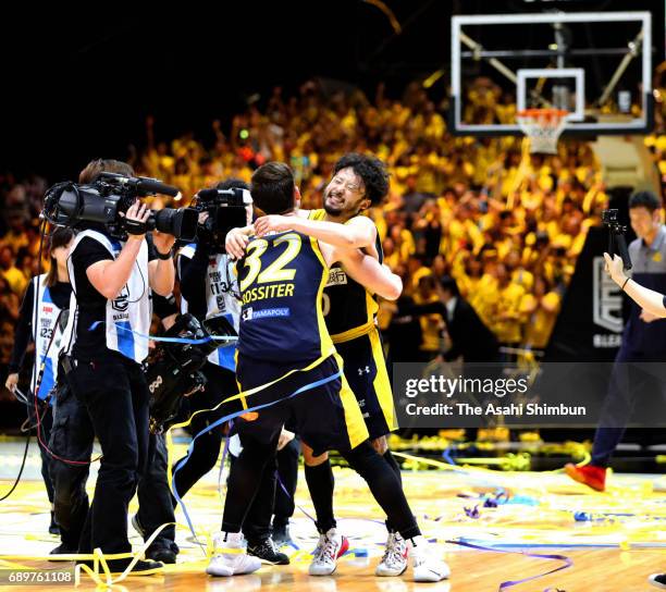 Yuta Tabuse and Ryan Rossiter of Tochigi Brex celebrate winning the B. League Championship final match between Kawasaki Brave Thunders and Tochigi...