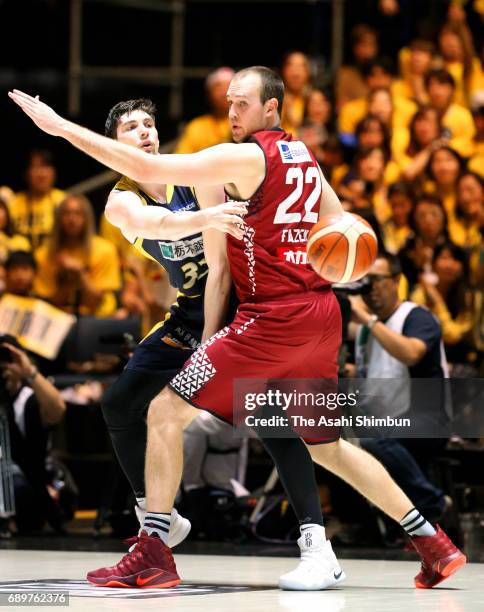 Ryan Rossiter of Tochigi Brex passes the ball during the B. League Championship final match between Kawasaki Brave Thunders and Tochigi Brex at...