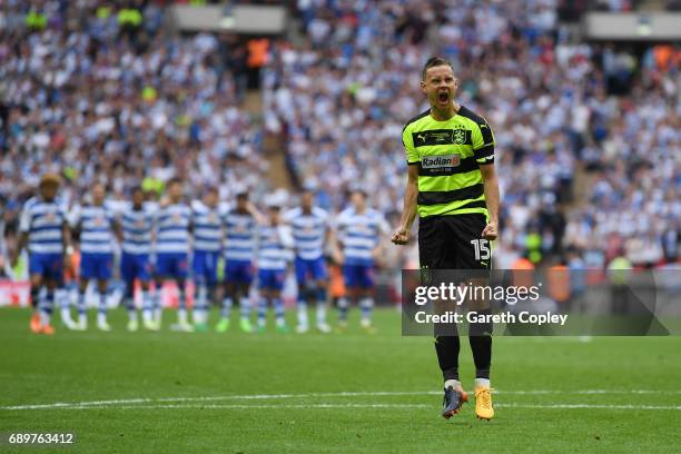 Chris Lowe of Huddersfield Town celebrates scoring his sides first penalty in the penalty shoot out after the Sky Bet Championship play off final...