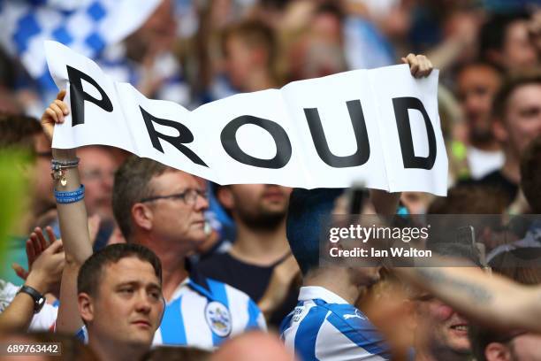 Huddersield Town fan holds up a sing after the Sky Bet Championship play off final between Huddersfield and Reading at Wembley Stadium on May 29,...