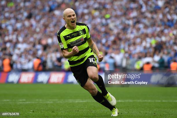 Aaron Mooy of Huddersfield Town celebrates scoring his sides fourth penalty in the penalty shoot out during the Sky Bet Championship play off final...
