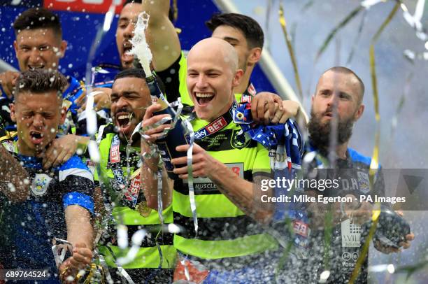 Huddersfield Town's Aaron Mooy celebrates winning the Sky Bet Championship play-off final at Wembley Stadium, London.