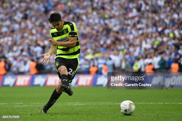 Christopher Schindler of Huddersfield Town scores the winning penalty during the penalty shoot out during the Sky Bet Championship play off final...