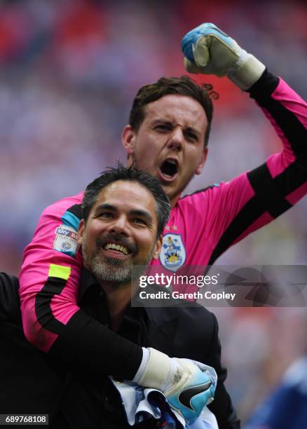 David Wagner, Manager of Huddersfield Town and Danny Ward of Huddersfield Town celebrate promotion to the Premier League after the Sky Bet...