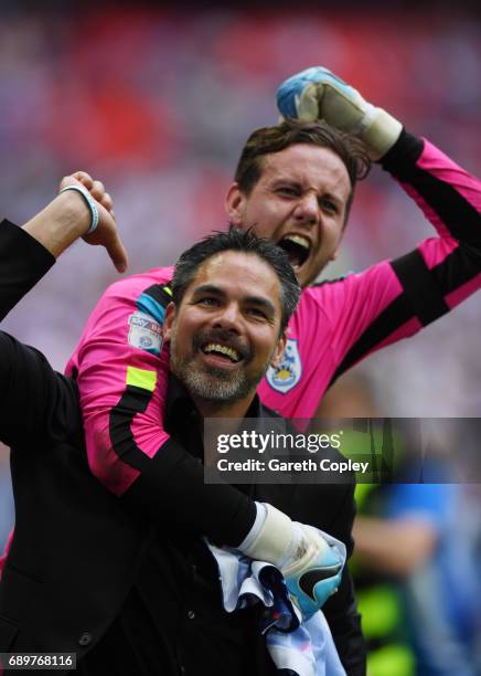 David Wagner, Manager of Huddersfield Town and Danny Ward of Huddersfield Town celebrate promotion to the Premier League after the Sky Bet...