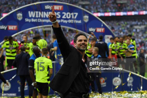 David Wagner, Manager of Huddersfield Town celebrates promotion to the Premier League after the Sky Bet Championship play off final between...