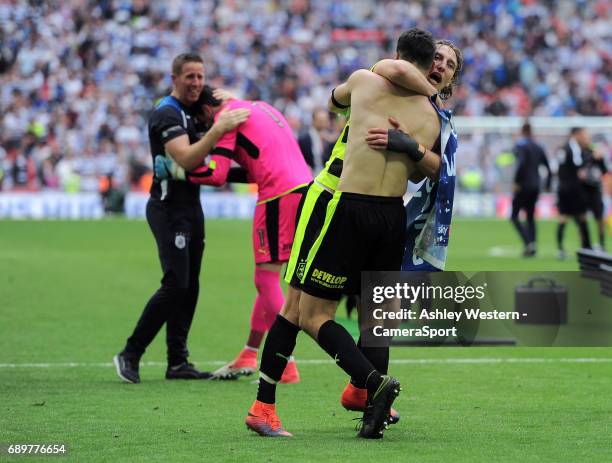 Huddersfield Town's Michael Hefele celebrates with Christopher Schindler after the EFL Sky Bet Championship Play-Off Final match victory over Reading...