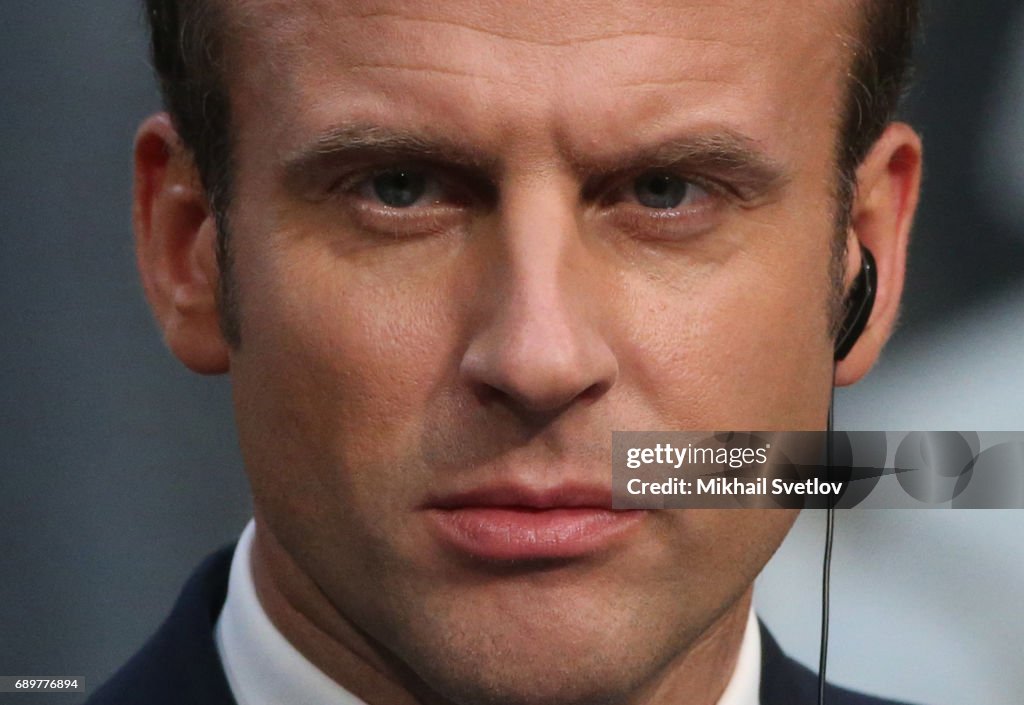 French President Emmanuel Macron receives Russian President Vladimir Putin in Versailles