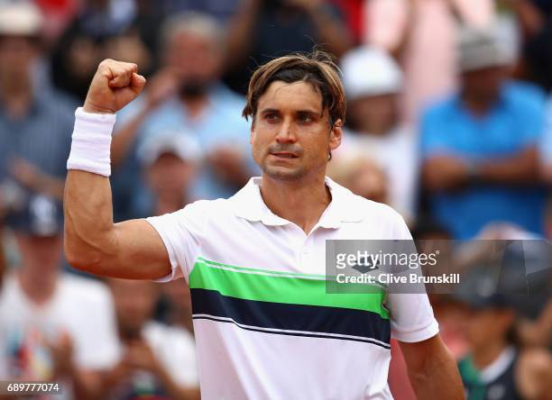 David Ferrer of Spain celebrates victory following the mens singles first round match against Donald Young of The United States on day two of the...