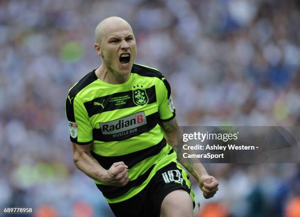 Huddersfield Town's Aaron Mooy celebrates his successful penalty during the shoot out in the EFL Sky Bet Championship Play-Off Final victory over...