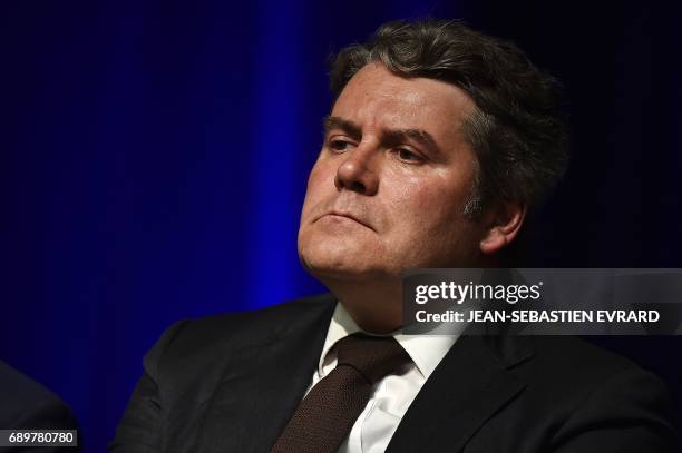 Right-wing Les Republicains party member and Pays de la Loire Regional Council member Franck Louvrier looks on during a public meeting with Francois...