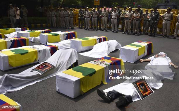 Tibetan youth Congress activists protest coffin march against China, after issue of 150 Self Immolation at Outside United Nation office at Lodhi Road...