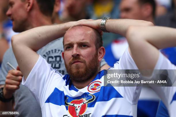 Reading fan dejected during the Sky Bet Championship Play Off Final match between Reading and Huddersfield Town at Wembley Stadium on May 29, 2017 in...