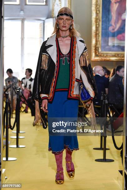 Model walks the runway at the Gucci Cruise 2018 show at Palazzo Pitti on May 29, 2017 in Florence, Italy.