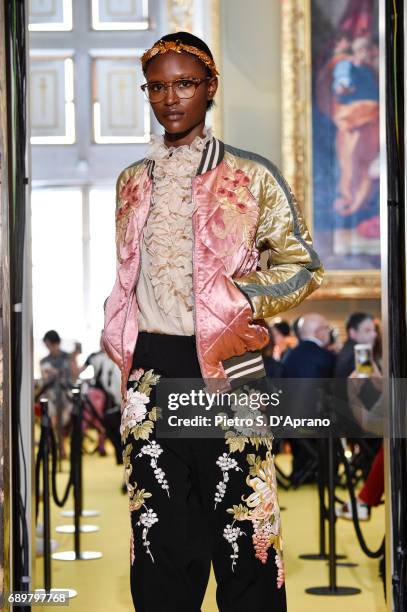 Model walks the runway at the Gucci Cruise 2018 show at Palazzo Pitti on May 29, 2017 in Florence, Italy.