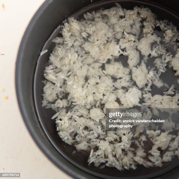 Sticky Rice Water Rice Cooking In Water Photos and Premium High Res Pictures - Getty Images