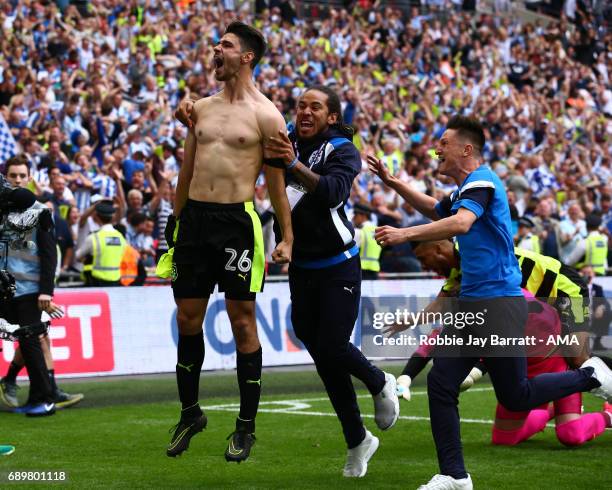 Christopher Schindler of Huddersfield Town celebrates after scoring the winning penalty during the Sky Bet Championship Play Off Final match between...