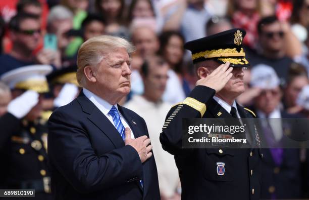 President Donald Trump participates in a wreath laying ceremony near the Tomb of the Unknown Soldier at Arlington National Cemetery in Arlington,...