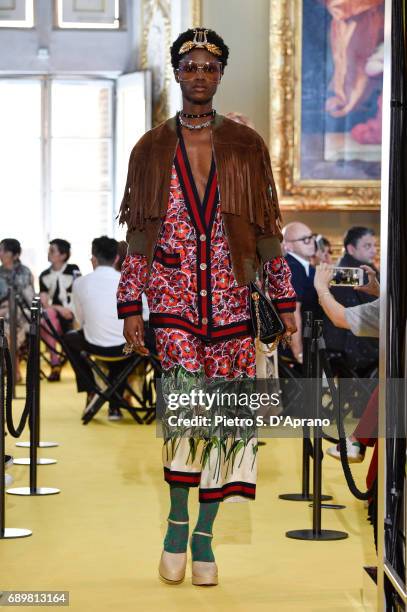 Model walks the runway at the Gucci Cruise 2018 show at Palazzo Pitti on May 29, 2017 in Florence, Italy.