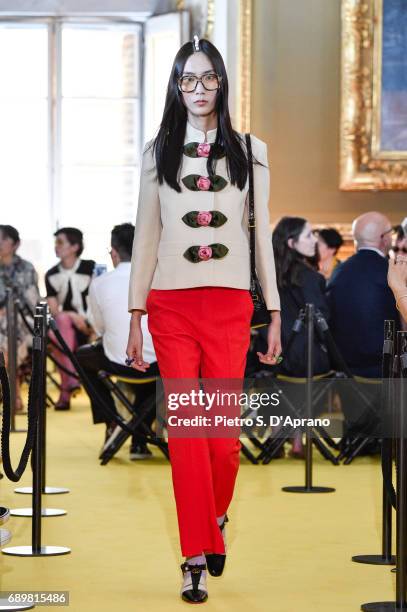 Model walks the runway at the Gucci Cruise 2018 show at Palazzo Pitti on May 29, 2017 in Florence, Italy.