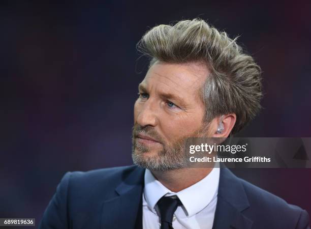 Robbie Savage of BT Sport looks on during the Emirates FA Cup Final between Arsenal and Chelsea at Wembley Stadium on May 27, 2017 in London, England.