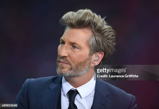 Robbie Savage of BT Sport looks on during the Emirates FA Cup Final between Arsenal and Chelsea at Wembley Stadium on May 27, 2017 in London, England.