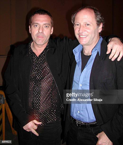 Actor Tom Sizemore poses with director Robert Dornhelm at the television movie premiere of "Sins Of The Father" at the Zanuck Theatre January 3, 2002...