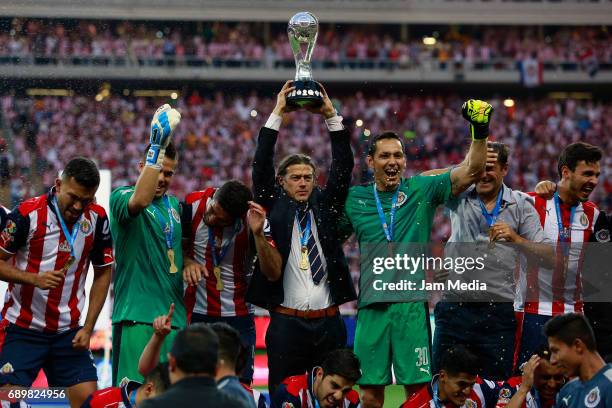 Matias Almeyda coach of Chivas lifts the champions trophy after winning the Final second leg match between Chivas and Tigres UANL as part of the...